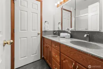 Hall bath with double vanity.