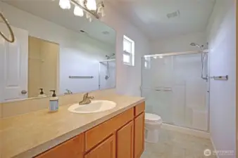 Primary bath w/ walk-in closet the right.