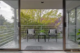 Private patio with privacy and partial city views