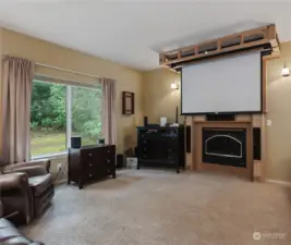 family room with projector screen