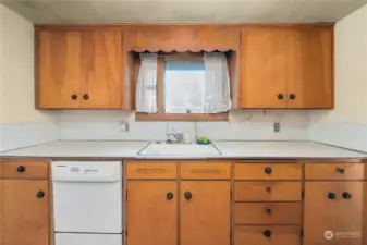 Keeping the same layout will still offer enough cabinets and counterspace.