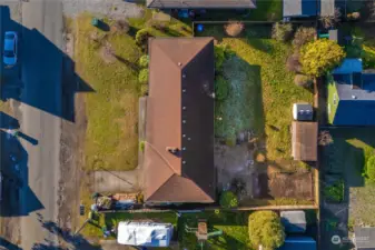 Aerial view of the lot - plenty of parking out front and alley access offers additional parking options.