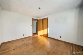 Bedroom #1 has exposed, original, hardwood flooring that is under all the carpeting through out the home.