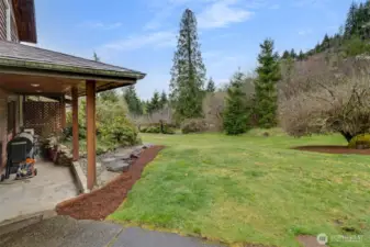 At the back of the house is a covered porch for year round BBQ.