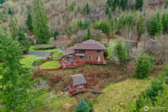 Aerial view from south. Outbuilding was used as a changing room for a previous hot tub.  What could you do with it?