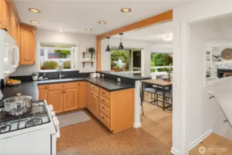 A spacious pantry is off to the left not seen but completes this thoughtfully laid out kitchen.