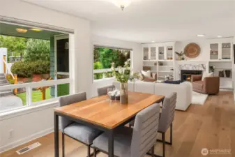 Windows everywhere pour in the natural light with the exterior landscaping providing a lush privacy from the street.