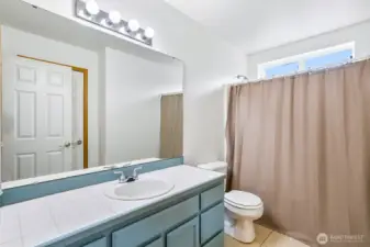 Upper-level guest bathroom.