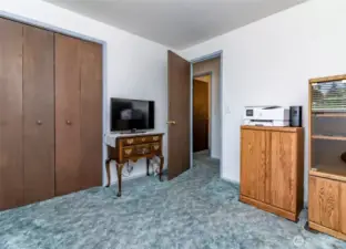 Bedroom 3. Hardwood floors under carpet have been covered since 1970's