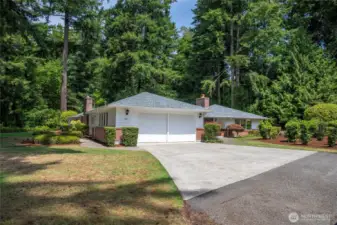 Street view of this amazing Lakewood Estate sitting on almost an acre.