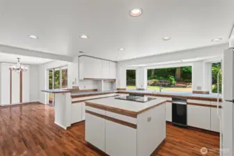 Huge open concept kitchen with tons of counter space and an Abundance of natural light.