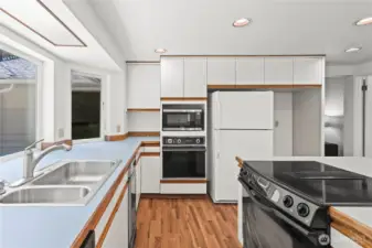 Another view of the kitchen.2 ovens and plenty of cabinet space.