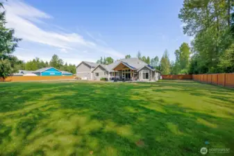 Flat one acre and private back yard setting