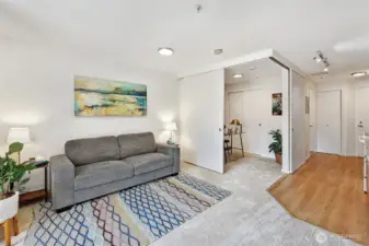 Staged with a Queen sized fold out sofa bed, this space can be used in different ways!