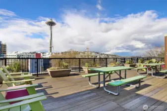 Rooftop Deck is very enjoyable. Tables, chairs and views for days...The Space Needle View!