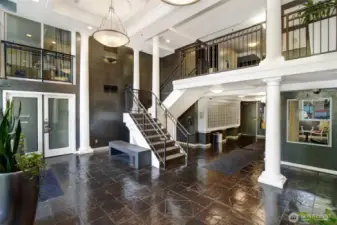 Lobby has a mezzanine, where package lockers make deliveries secure.