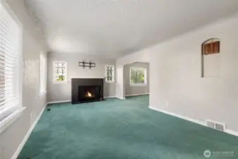 Spacious Living Room with Classic Fireplace Focal Point