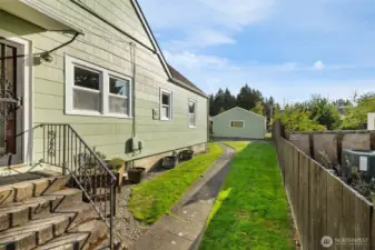 Fenced Back Yard leads to 2 Car Garage