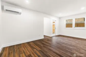 The home features: a heat-recovery ventilation system, a highly efficient mini-split heat pump- pictured here, and efficient light as well!