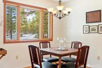 Large picture window brings natural light to your meals here!