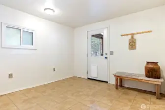 Covered entry from 2 vehicle attached Carport. Easy care flooring is linoleum. Large coat closet. Electric B.B. Heat.