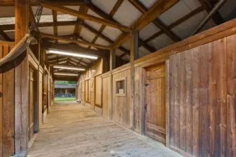 Look at this barn! Clean as a whistle with rich, wood paneled walls.