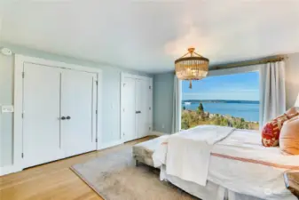 Picture window showcases the amazing view.  Walk-in closet on the right with built-in’s.