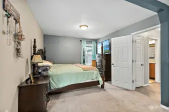 Main level primary bedroom, spacious and bright.