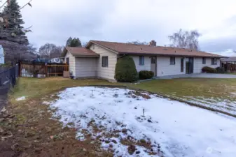 Rear of house, side yard and garden spot