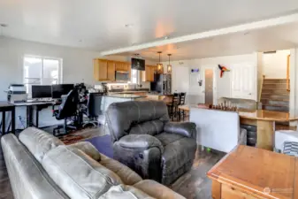 The three doors on the back wall lead to the utility room, pantry and storage closet (from left to right).