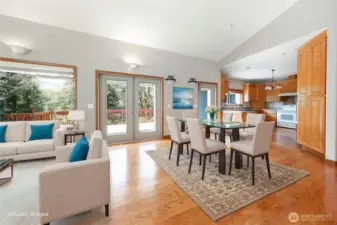 Dining area with oak hardwood floors.