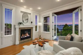 Gorgeous living room with sweeping views and second gas fireplace