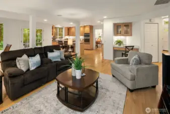 Open concept family room flows into kitchen