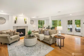 This home features an open-concept layout with a family room that flows into the kitchen, offering a bright, connected space designed for comfort and functionality.