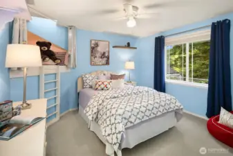 2nd bedroom upstairs with charming reading nook.