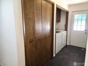 Laundry and deck entrance, located between guest bath and kitchen