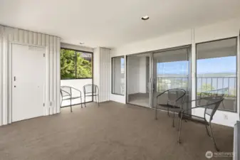 Enclosed and heated deck with storage closet