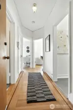 Enjoy original hardwood floors and inlays throughout the home.