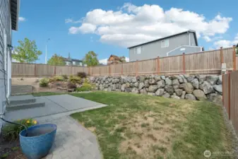 Peaceful Waterfall in the corner of the Fully Fenced Backyard