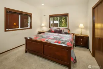 Primary bedroom on main floor with en-suite shared full bath