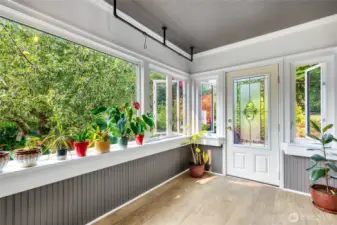 enclosed sun room, great for the plant enthusiast.