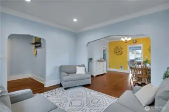 Living Room looking back toward the awesome entry hall & towards the dining room through the arched openways.