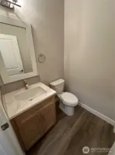 FOR ILLUSTRATION PURPOSES Main floor 1/2 bath off the kitchen and garage