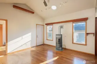 The high up boxes on the walls are up lighting for additional lighting in most rooms.  Beautiful cherry wood flooring in most areas.