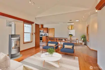 The built in bookcase divides the dining from the living area and adds nice storage for a smaller home.