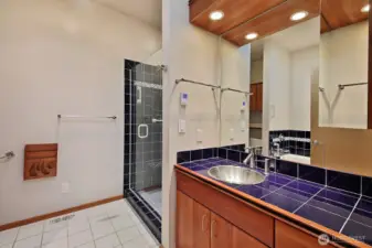 Primary bathroom with walk in shower and jetted tub...those heated floors feel so good!