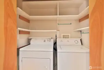 Laundry on the hall.  There is also an additional storage closet to tuck away coats and such.