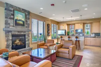 . . .a cozy lounge with full kitchen and TV . .