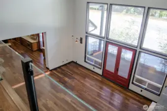 This is a view of the living room from exiting the primary suite on the second floor.