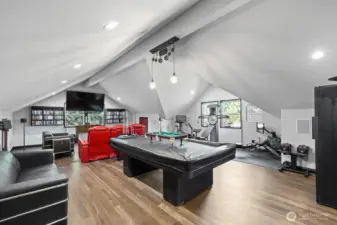 The large Bonus Room with 1/2 bath is a versatile and inviting space designed to accommodate a variety of needs and activities.  It is ideal for hosting gatherings and social events.  For those who work from home or indulge in hobbies, this room offers the space and tranquiity needed for productivity and creativity.  The spaciousness allows for the setup of a functional home office.  The Bonus Room is sure to enhance the functionality and enjoyment of your home.